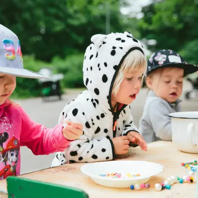 Children eating at the playground.