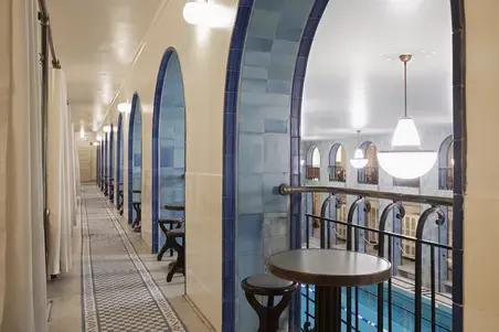 2nd floor corridor and table with chairs.